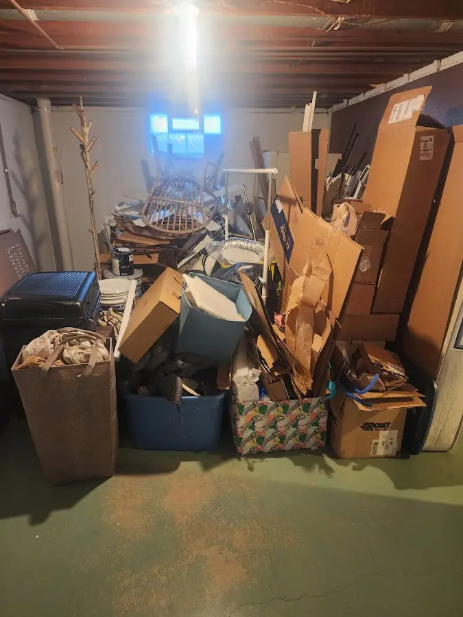 Roll-off dumpster container at job site for Yard Waste Dumpster Rental in Ossining